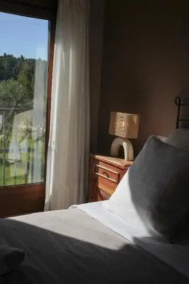 Cama o camas de una habitación en Hotel Hort De Fortunyo