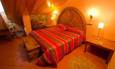 Cama o camas de una habitación en Hotel Villa Románica