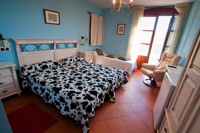 Cama o camas de una habitación en Hotel Villa Románica