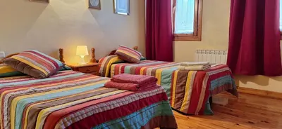 Cama o camas de una habitación en BALLBENAS