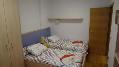 Cama o camas de una habitación en Gaztanbide Apartamento rural