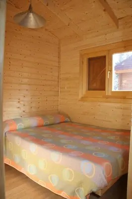 Cama o camas de una habitación en Camping Cañones de Guara y Formiga