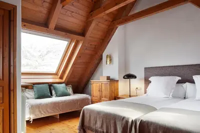 Cama o camas de una habitación en Banhs de Arties by FeelFree Rentals