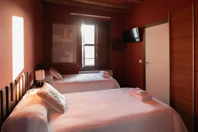 Cama o camas de una habitación en La Casa Azul