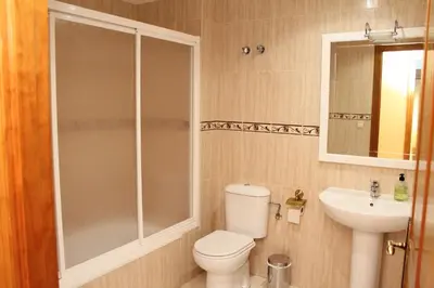 Un baño de Apartamentos Clavería