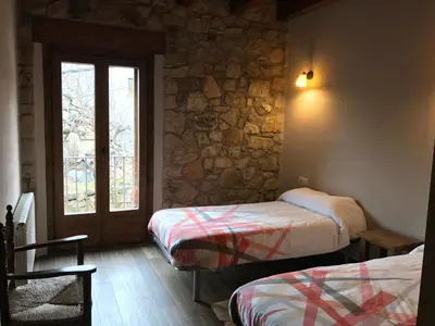 Cama o camas de una habitación en Cal Remolins