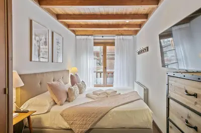 Cama o camas de una habitación en Luderna - Apartamento Val de Ruda A4 Montpius