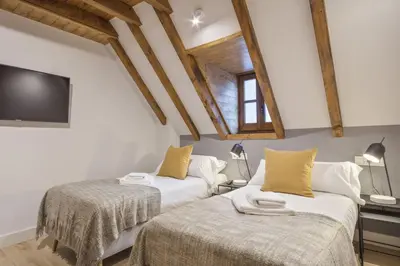 Cama o camas de una habitación en Luderna - Casa Pleta de Arties Pruedo