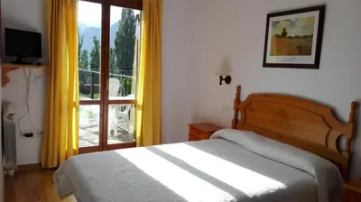 Cama o camas de una habitación en Apartamentos Ball Benas Edificio Mirador