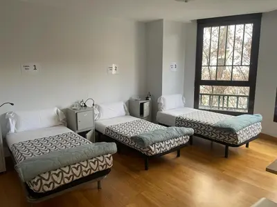 Cama o camas de una habitación en Aloha Hostel