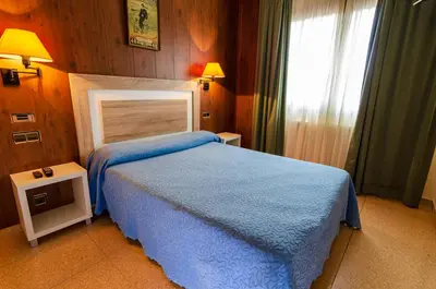 Cama o camas de una habitación en Hotel Venta La Pintada