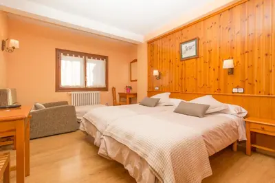 Cama o camas de una habitación en Hostal Casa Rosita