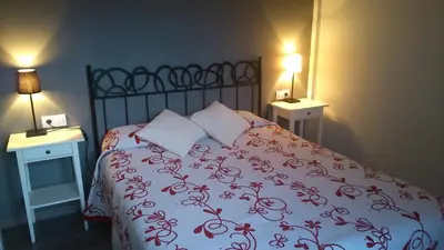 Cama o camas de una habitación en Apartamentos San Gregorio