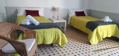 Cama o camas de una habitación en espai Abadia