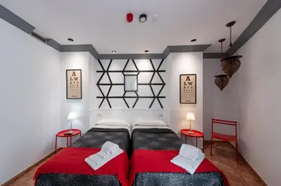 Cama o camas de una habitación en Apartamentos Los Angeles