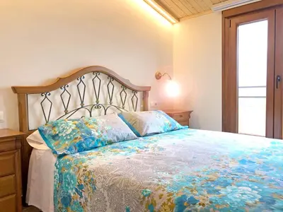 Cama o camas de una habitación en Spacious House in Cretas with Mountain View