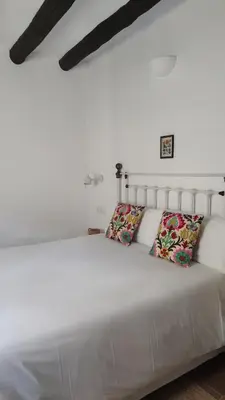 Cama o camas de una habitación en Hostal Blavet