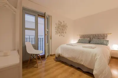 Cama o camas de una habitación en Apartamento Bardenas en el centro de Tudela