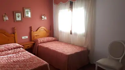 Cama o camas de una habitación en Pension Malida