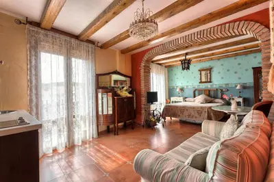 Una televisión o centro de entretenimiento en CASA RURAL VILLA DE VERA