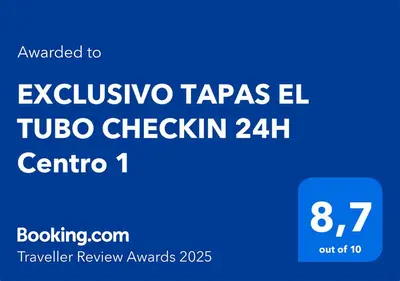 Certificado, premio, señal o documento que está expuesto en EXCLUSIVO TAPAS EL TUBO CHECKIN 24H Centro 1
