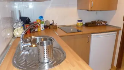 Una cocina o zona de cocina en COMO EN TU CASA Canfranc Estación