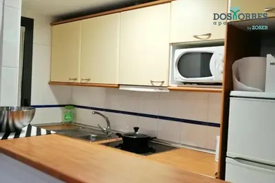 Una cocina o zona de cocina en Apartamentos Dos Torres Gandalf - Excelente ubicación centrica con garaje incluido