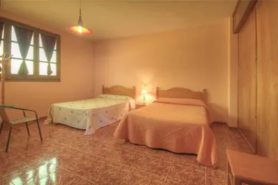Cama o camas de una habitación en Albergue Barranc de la Serra