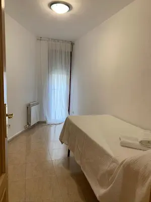 Cama o camas de una habitación en Apartamento dúplex en el centro de Huesca
