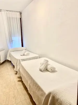 Cama o camas de una habitación en Apartamento dúplex en el centro de Huesca
