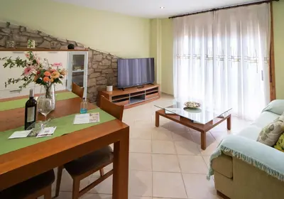 Una televisión o centro de entretenimiento en Enoturismo Celler Piñol