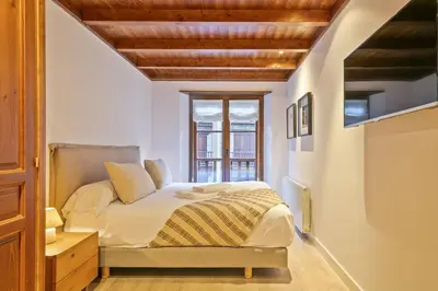 Cama o camas de una habitación en Luderna - Apartamento Val de Ruda A5 Orla