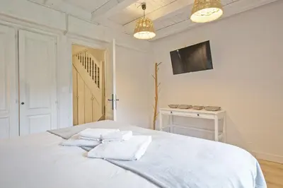 Cama o camas de una habitación en Luderna - Casa con jardín Bedrera