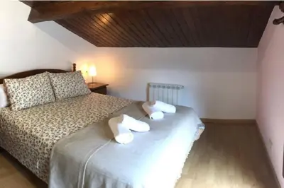 Cama o camas de una habitación en Duplex La Valle Ordesa-Ainsa