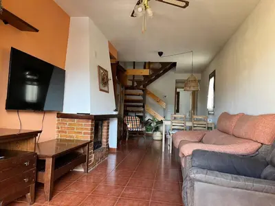 Una televisión o centro de entretenimiento en Duplex La Valle Ordesa-Ainsa