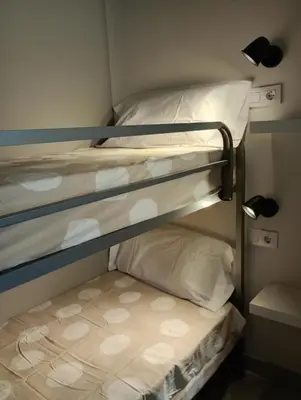 Cama o camas de una habitación en Allotjament Rural Solsona