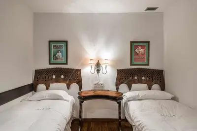 Cama o camas de una habitación en Mauberme by SeaMount Rentals