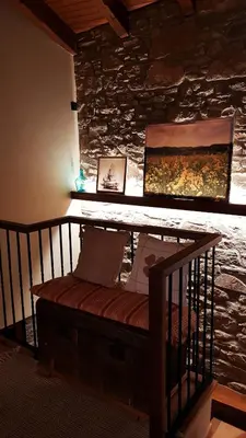 Una televisión o centro de entretenimiento en Casa Ton del Mingo