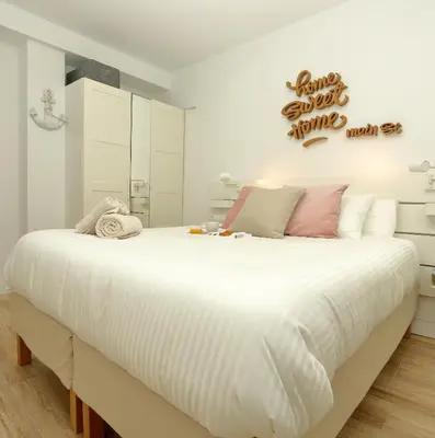 Cama o camas de una habitación en Home Sweet Home Main St Pamplona