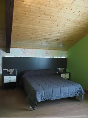 Cama o camas de una habitación en Casas rurales en Fanlo y Valle Vio