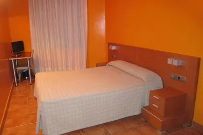 Cama o camas de una habitación en Ca l'Àngel