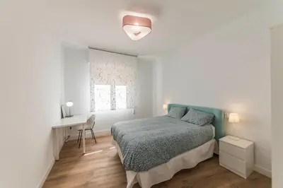 Cama o camas de una habitación en Apartamento Turístico IRATI