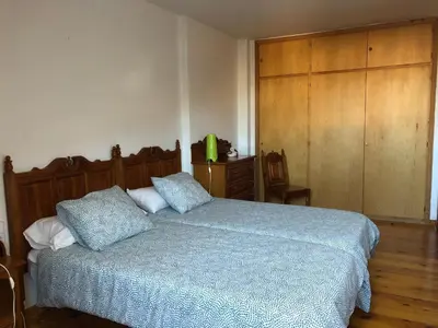 Cama o camas de una habitación en EVA & TRAVEL - Triplex La Cavallada
