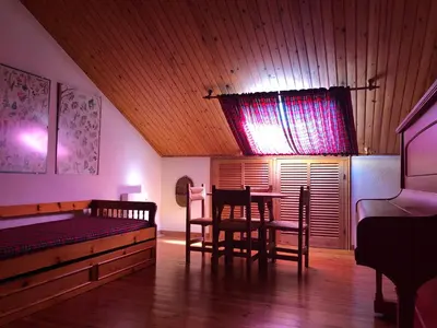 Cama o camas de una habitación en EVA & TRAVEL - Triplex La Cavallada