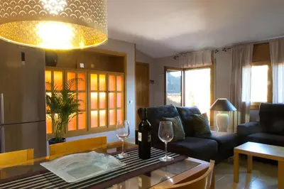 Zona de estar de Ático con terraza en Graus-Pirineo de Huesca