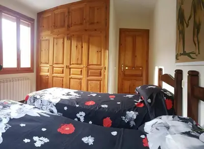 Cama o camas de una habitación en Ático-Duplex Basa la Mora