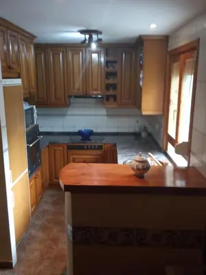 Una cocina o zona de cocina en Ático-Duplex Basa la Mora