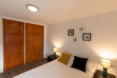 Cama o camas de una habitación en Anayet - Plaza del Reloj en FORMIGAL - by PIRINEOS 360