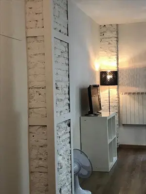 Una televisión o centro de entretenimiento en Apartamento Casa Latre