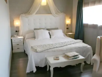 Cama o camas de una habitación en Hotel Castillo de Alquézar
